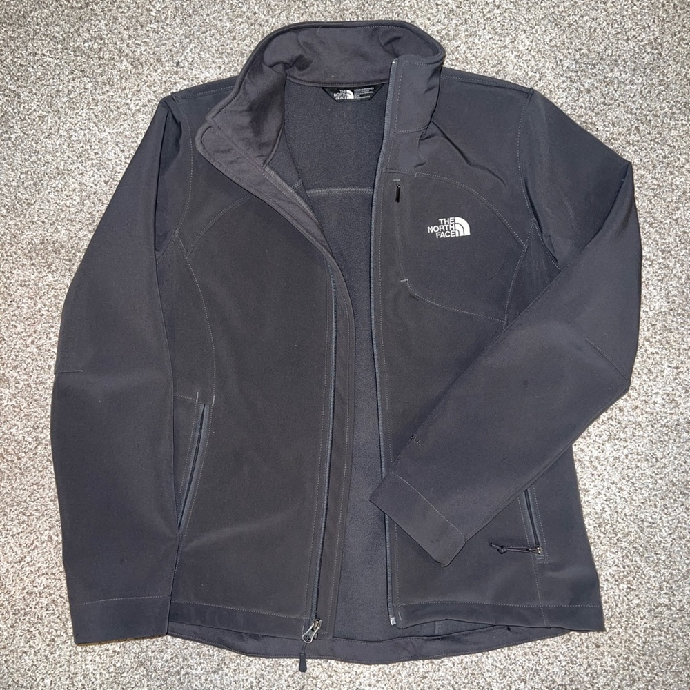 Lightweight weather resistant north face jacket. Charcoal grey. Hardly worn.